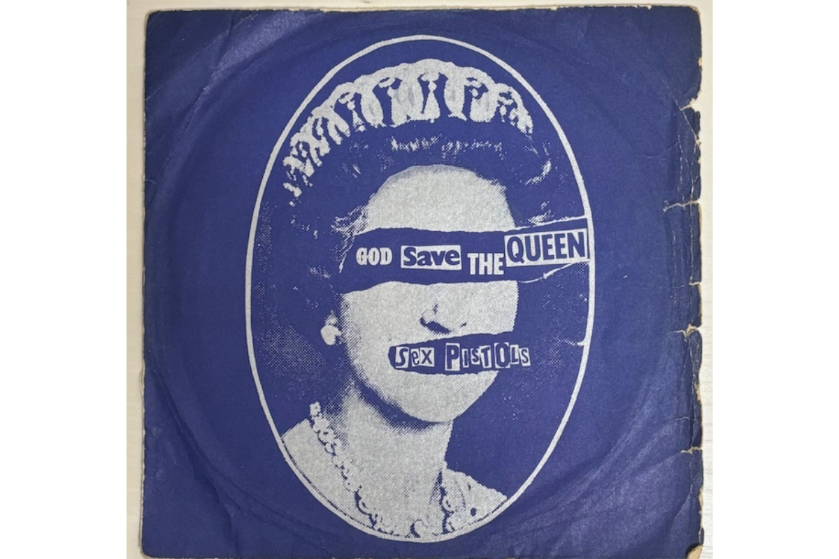 UK 7-inch cover of Sex Pistols’ “God Save The Queen” featuring Queen Elizabeth with obscured eyes and mouth