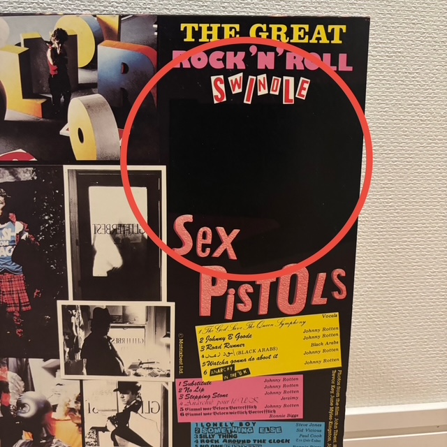Censored label section blacked out on gatefold