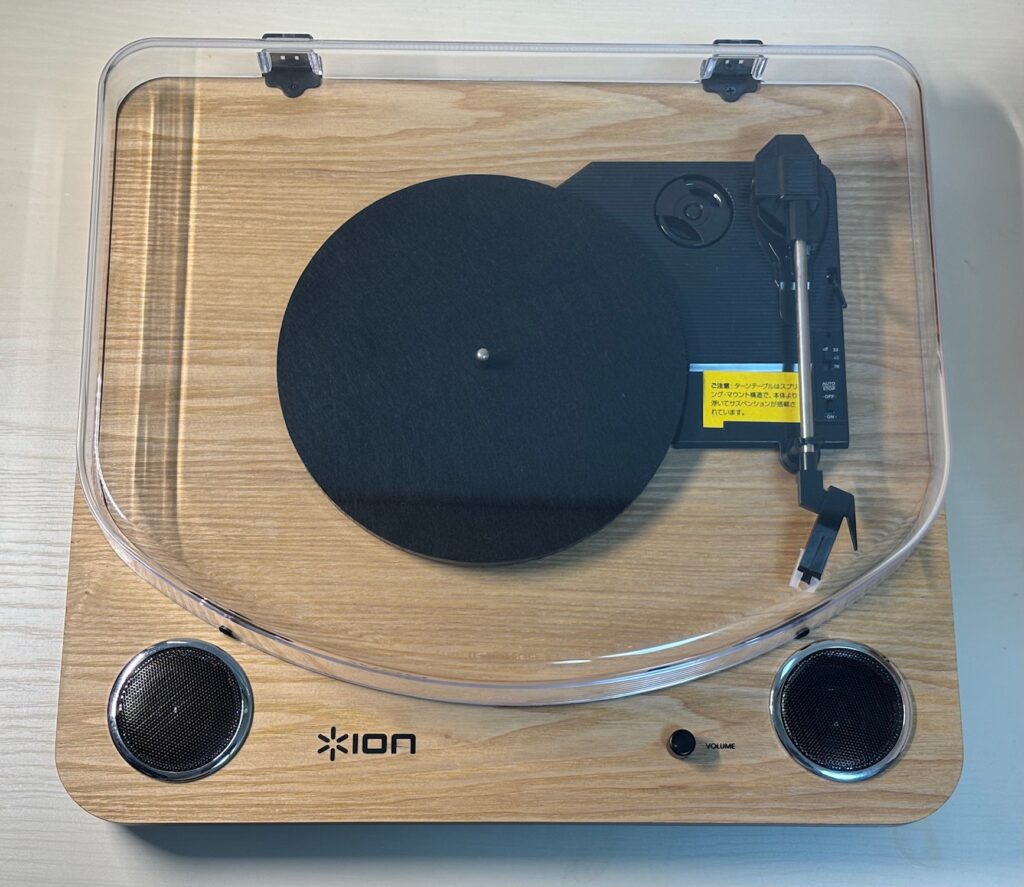 The ION Max LP turntable – natural wood design with built-in speakers.