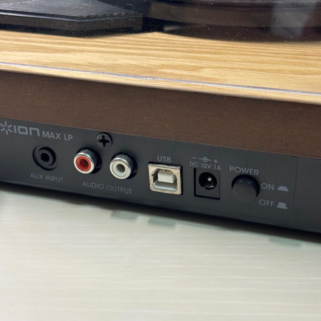 Rear panel connections — RCA, AUX, and USB for flexible setup.