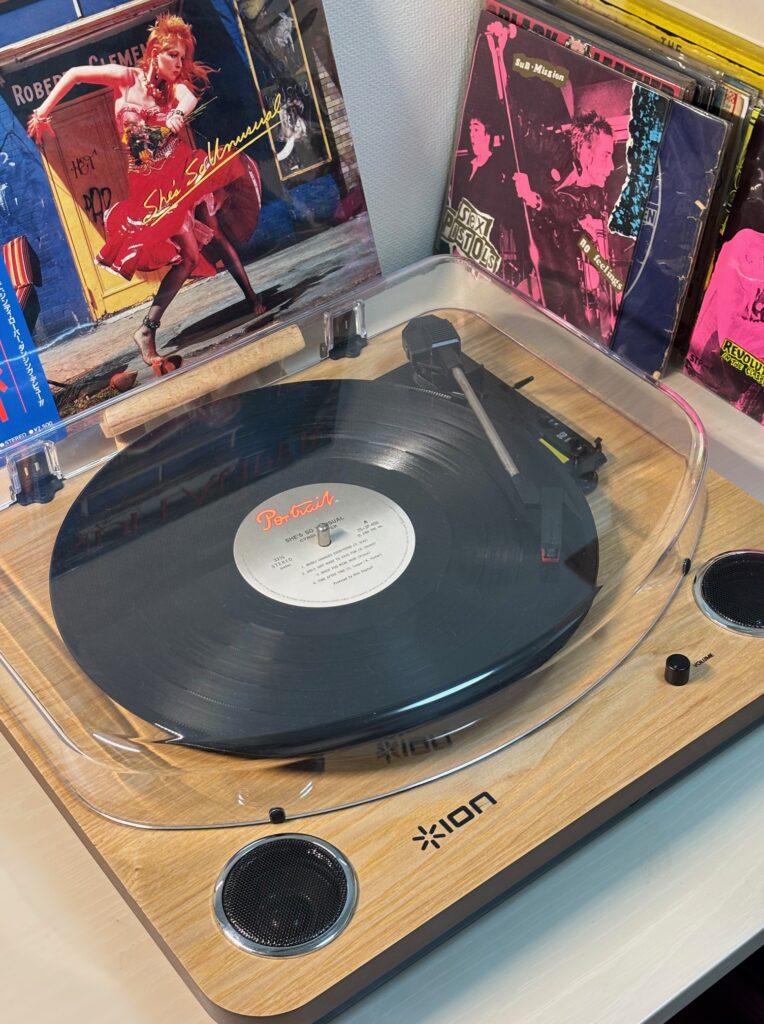 Spinning vinyl on the ION Max LP — warm, nostalgic sound you can feel.